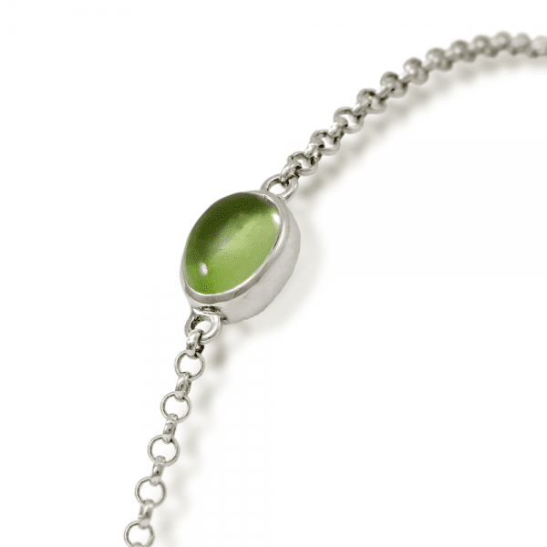 close up of Peridot Cabochon Bracelet - silver - by Scarab Jewellery Studio