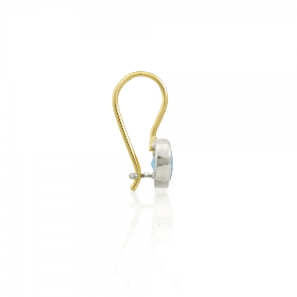 Side view of Swiss Blue Topaz heart earring in silver and gold by Scarab Jewellery Studio