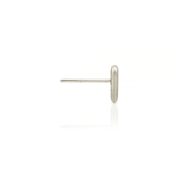 Side view of single Tiny Valentine Hearts Earrings Silver by Scarab Jewellery Studio