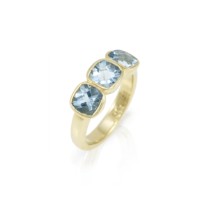 Three Stone Aquamarine ring in yellow gold by Scarab Jewellery Studio