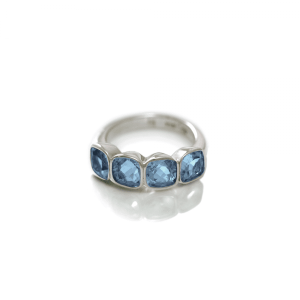 Four Stone Blue Topaz Silver Ring by Scarab Jewellery Studio