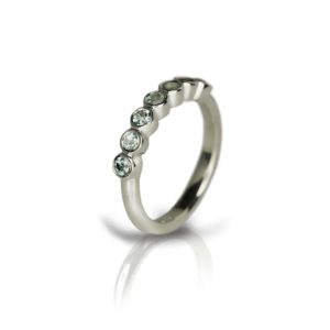 Silver Seven Stone blue topaz Ring by Scarab Jewellery Studio